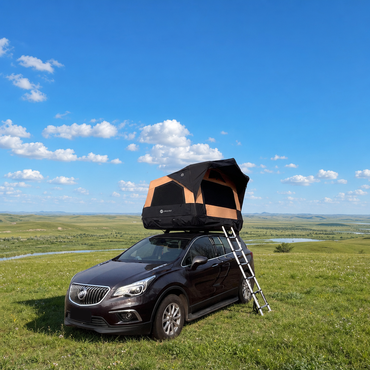 PlayDo Skiff rooftop tent on a mountain road trip